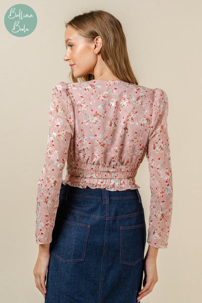 Blusa rosa de flores