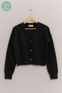 Sweater negro con corazones