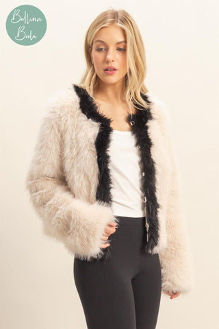 Sweater crema con negro