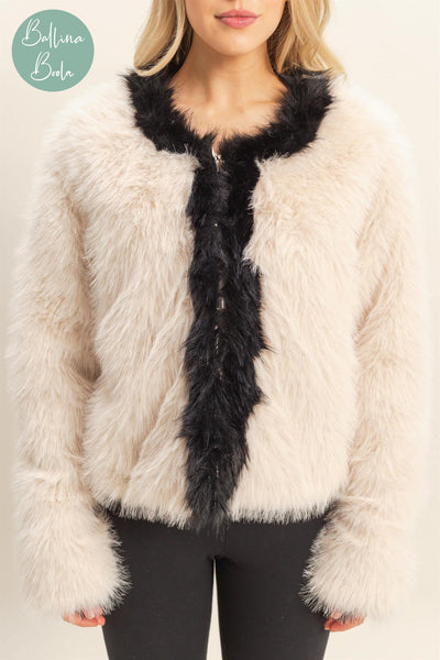 Sweater crema con negro