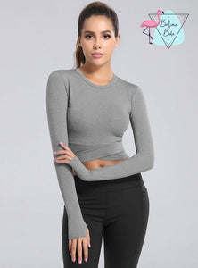 Top deportivo manga larga gris