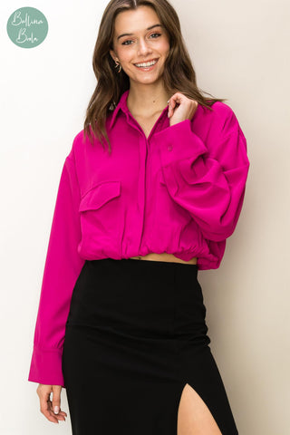 Blusa magenta manga larga