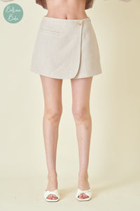 Falda short crema