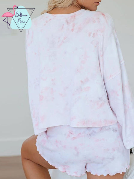 Conjunto de pijama rosa y blanco