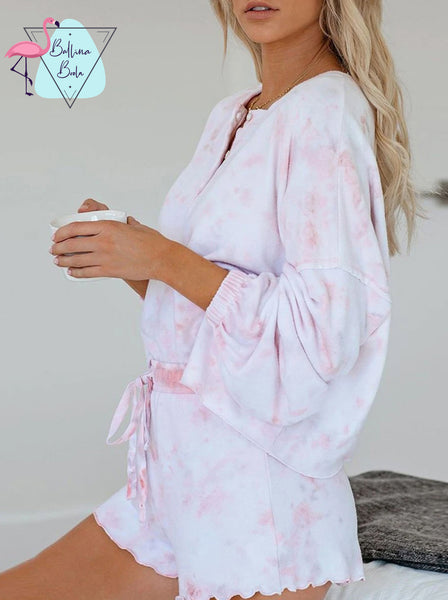 Conjunto de pijama rosa y blanco